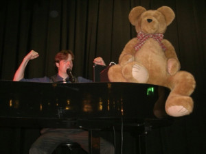 teddy bear on piano