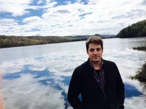 greg and a reflective lake