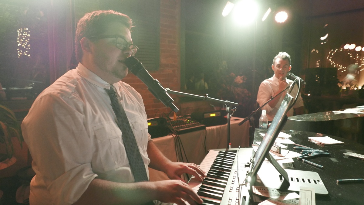 T. Duncan Parker Singing and Playing Piano