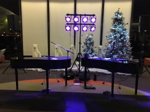 Dueling Pianos, all set up in Naperville, a crowd of Polar Bears cheers us on.