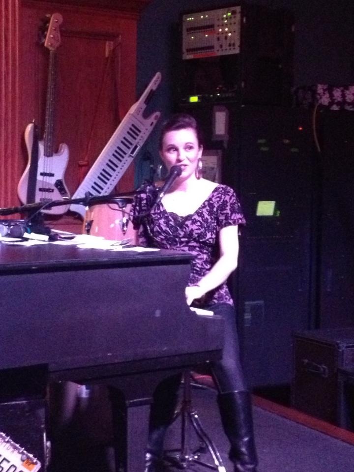 katie pinder brown performing at piano