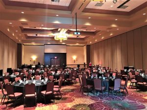 Ballroom setup for a corporate event hosted at the Bloomington-Normal Marriott.