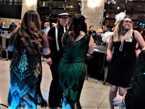 Guests dressed to the 1920's themed event hosted at South Second in Milwaukee.