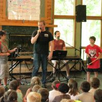 Adler Day Camp Performance on stage volunteers