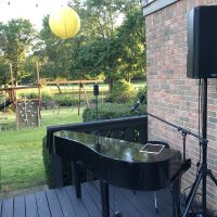 50th Birthday Backyard Party piano set up