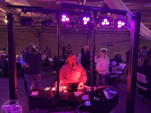 Guests dancing around Felix And Fingers Dueling Pianos