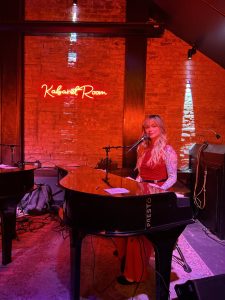 Dueling pianos performance at Speakeasy