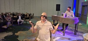 Audience enjoying Felix And Fingers performance at the Marriott Shoals Conference Center
