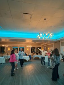 The crowd enjoying the dueling pianos at The Club at New Seabury