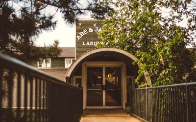 Grand Staircase Moments and Raw Industrial Elegance at Abe & Jake’s Landing