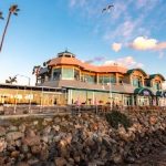 Festively Decorated Boathouse on the Bay Lights Up with Dueling Pianos Magic Boathouse on the Bay