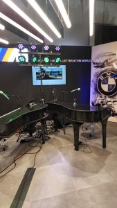 Melia Farrelly performing with Felix And Fingers Dueling Pianos at BMW of Annapolis in Annapolis, Maryland