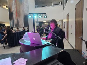 Louie Juarez performing with Felix And Fingers Dueling Pianos at Westwood School in Addison, Texas