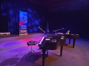 Bethany Lorentzen performing with Felix And Fingers Dueling Pianos at Stage West Theatre in Fort Worth, Texas