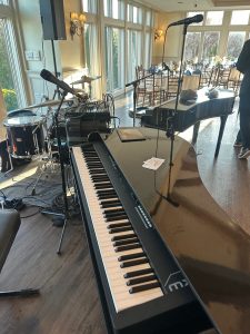 Katie Cronin performing with Felix And Fingers Dueling Pianos at Barker House by Wedgewood Weddings in Scituate, Massachusetts