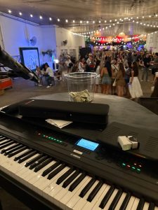 Isaac Cooremans performing with Felix And Fingers Dueling Pianos at BUS in Corpus Christi, Texas
