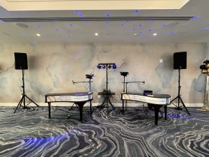 Meny Leizerovich performing with Felix And Fingers Dueling Pianos at Grand Hyatt Tampa Bay in Tampa, Florida