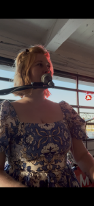 Maggie Boone performing with Felix And Fingers Dueling Pianos at 2000 Grand Blvd in Kansas City, Missouri