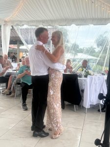Jaclyn Arnold performing with Felix And Fingers Dueling Pianos at a private wedding celebration in Stuart, Florida