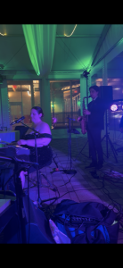 Katie Cronin performing with Felix And Fingers Dueling Pianos at New England Aquarium in Boston, Massachusetts