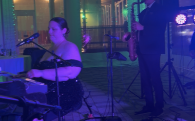 Penguins, Pop-Punk, and a Chair-Lifted Hora: Rachel and Todd’s New England Aquarium Wedding