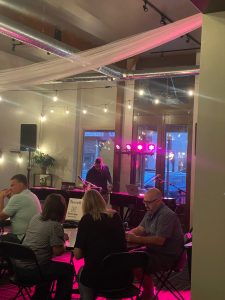 Casey Cross performing with Felix And Fingers Dueling Pianos at Hometown Grounds Coffee in Tuscola, Illinois