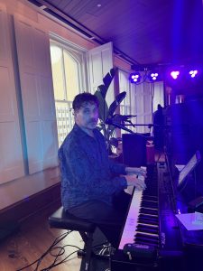 Michael Clavijo performing with Felix And Fingers Dueling Pianos at The Sazerac House in New Orleans, Louisiana