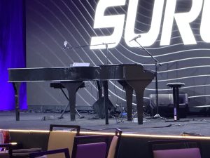 Tyson Leslie performing with Felix And Fingers Dueling Pianos at Omni Nashville Hotel in Nashville, Tennessee