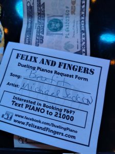Jacob Hoglund performing with Felix And Fingers Dueling Pianos at The Growler Guys Taphouse in Grants Pass, Oregon