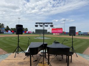 Eben Seaman performing with Felix And Fingers Dueling Pianos at Cedar Rapids Kernels in Cedar Rapids, Iowa