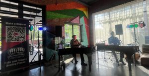 Timothy Hawn performing with Felix And Fingers Dueling Pianos at Moxy Chattanooga Downtown in Chattanooga, Tennessee