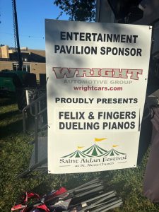 Quinton Zigler performing with Felix And Fingers Dueling Pianos at St Aiden's Parish in Wexford, Pennsylvania