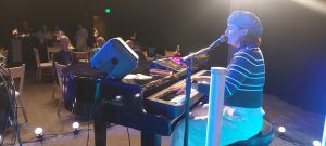 Kyle Brody performing with Felix And Fingers Dueling Pianos at a private corporate event in Amherst, Massachusetts
