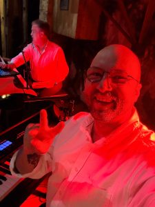 Jimi Gibbons performing with Felix And Fingers Dueling Pianos at Bella Terre Vineyard & Reception Hall in Glenwood, Iowa