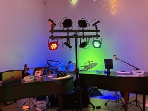 Maxwell Ward performing with Felix And Fingers Dueling Pianos at Riceville Community Center in Riceville, Iowa