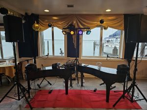 Trent Little performing with Felix And Fingers Dueling Pianos at Waterman's Crab House in Rock Hall, Maryland