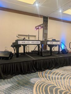 April Bennett performing with Felix And Fingers Dueling Pianos at Hyatt Regency Greenville in Greenville, South Carolina