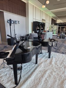 Bethany Lorentzen performing with Felix And Fingers Dueling Pianos at Omni PGA Frisco Resort & Spa in Frisco, Texas