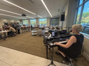 Jordan Peterson performing with Felix And Fingers Dueling Pianos at Busey Bank in Leawood, Kansas