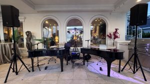 Philip Mahoney performing with Felix And Fingers Dueling Pianos at a private corporate event in Tampa, Florida